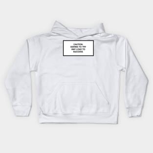 Caution: Daring to try may lead to success. Kids Hoodie